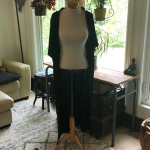 Lululemon cape/wrap in black.
